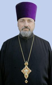 Prot. Mitr. Ioan Cucuietu